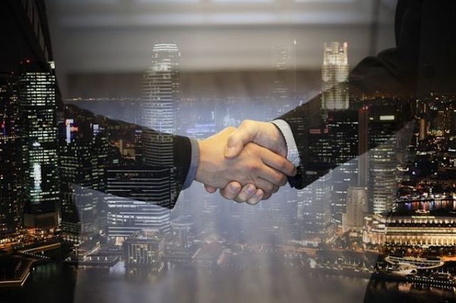 handshake to secure a deal feature