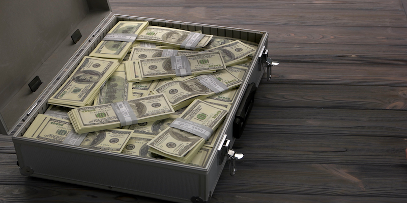 briefcase with money to represent business valuation
