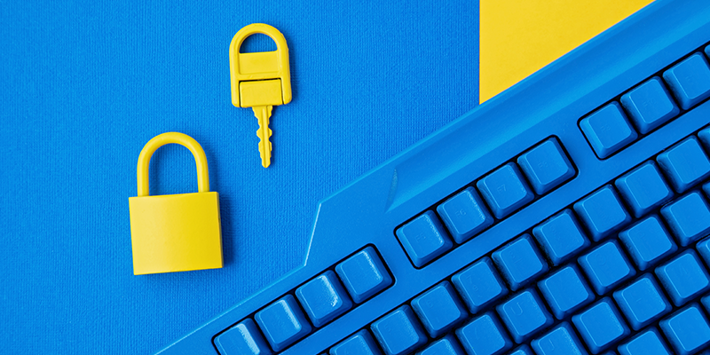 cyber-security-yellow-padlock-key-blue-keyboard